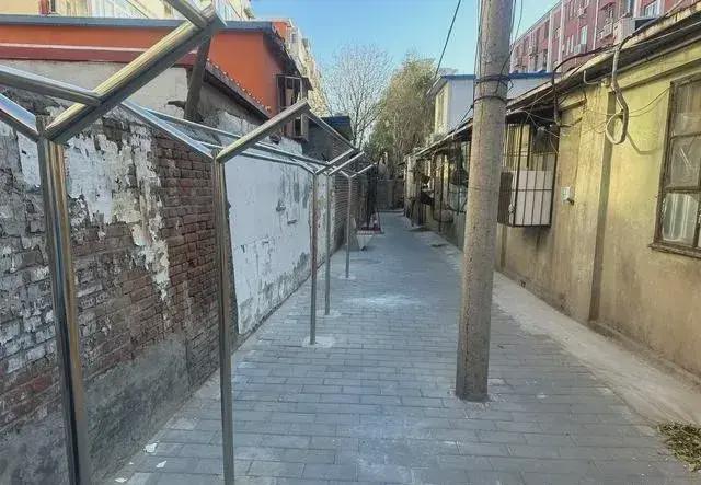 建居民想提升小区环境的愿望实现了K8凯发拆除700平方米私搭乱(图1)